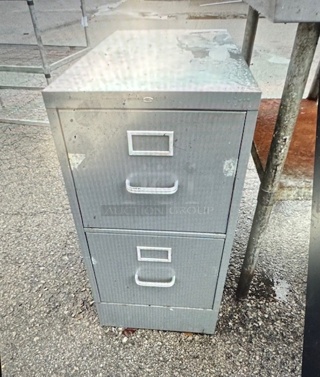 One 2 Door Metal File Cabinet. 15X26.5X29