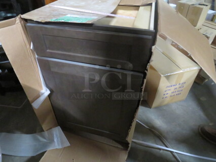 One NEW Echelon 1 Door, 1 Drawer Cabinet In A Storm Finish. B21L. 