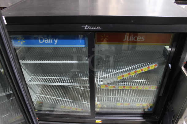 2019 True GDM-41SL-48-HC-LD Metal Commercial 2 Door Reach In Cooler Merchandiser w/ Poly Coated Racks. 115 Volts, 1 Phase. Tested and Powers On But Does Not Get Cold