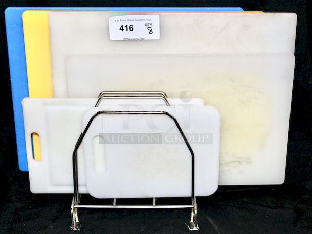 NO JOB TO BIG OR SMALL! Set of (7) Various Sized Cutting Boards and Steel Organizer. 
8x YourBid