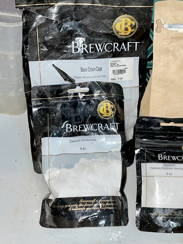 BREWER'S MONSTER LOT: 
Amoretti 2 FL OZ (60 ml) Extracts: Ginger W.S. EXTRACT #522, Chocolate "Crème de Cacao" W.S. Extract #72, Natural Habanero Hot Pepper W.S. Extract 689,  Juniper Berry Terpeneless O.S. Extract #663, Natural Roasted Peanut W.S. Extract #1356, Italian Hazelnut Liqueur Type
W.S. Extract #503, Natural Pumpkin Pie Sauce W.S. Extract 1285, Organolicious
Premium Blue Agave Nectar Amber 
Amoretti 4fl Oz: Cherry Marbleizing Swirl #SW12-V1, Pineapple Marbleizing Swirl #SW16, Mojito Marbleizing Swirl #SW27, Hazelnut Compound #336, Passion Fruit ARTISAN #ART1-NS, Red Sour Cherry COMPOUND #302-V1, Irish Coffee
COMPOUND #3087, Pineapple COMPOUND #301, Marshmallow W.S. EXTRACT #1010, Chai "Tea" COMPOUND #399, Lychee COMPOUND #384, Wine Blossom COMPOUND #3036, Pineapple ARTISAN #ART10, Coconut
SWIRL #SW17, Blood Orange SWIRL #SW383-VI, 
McCormick Coconut Extract
Beer Craft: Black Crown Caps, Calcium Carbonate, Gypsum x2, 
Pure: Calcium Sulfate Dihydrate Gypsum
Citric Acid & Calcium Chloride - Image 5 of 11