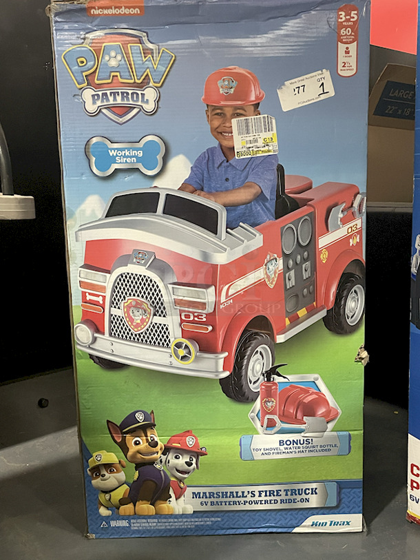 NEW!! Kid Trax Nickelodeon Paw Patrol Marshall’s Fire Truck 6v Battery-Powered Ride-On With Working Siren. Includes: 6v Battery & Charger,  Toy Shovel, Water Squirt Bottle & Fireman’s Hat 23.58 x 41.66 x 26.33 - Image 1 of 5