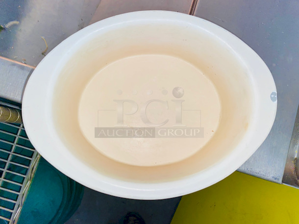 DO NOT PASS THIS UP!! Shelf Full of (29) Bon Chef Bon Chef 5103PWHT 2.75 Qt. White Sandstone Finish Cast Aluminum Oval Food Pans.

Overall Dimensions:
Length: 12 3/8"
Width: 9 1/8"
Capacity: 2.75 qt.  - Image 3 of 4