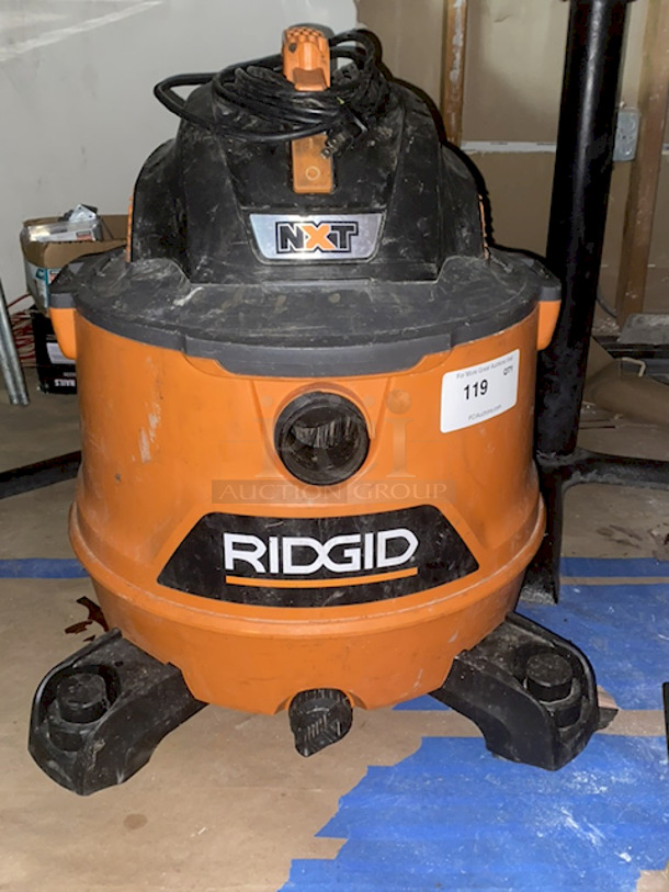 AWESOMENESS! Rigid NXT Wet Dry Vac, 14 Gal. 6.0-Peak Horse Power. 20ft Cord On Base With Rugged Heavy Duty Casters. In Working Order.