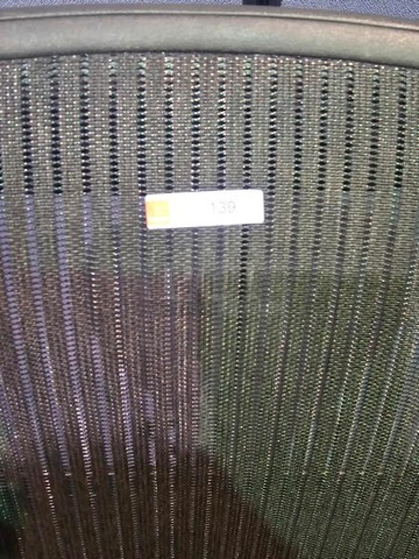 Herman Miller guest chairs with armrests. Black in color,  great chairs in good condition! Some scratches on front of metal frame that could be easily touched up for designer chairs. They measure 38” H x 32.5” W x 21” D. BIDX2 - Image 3 of 3