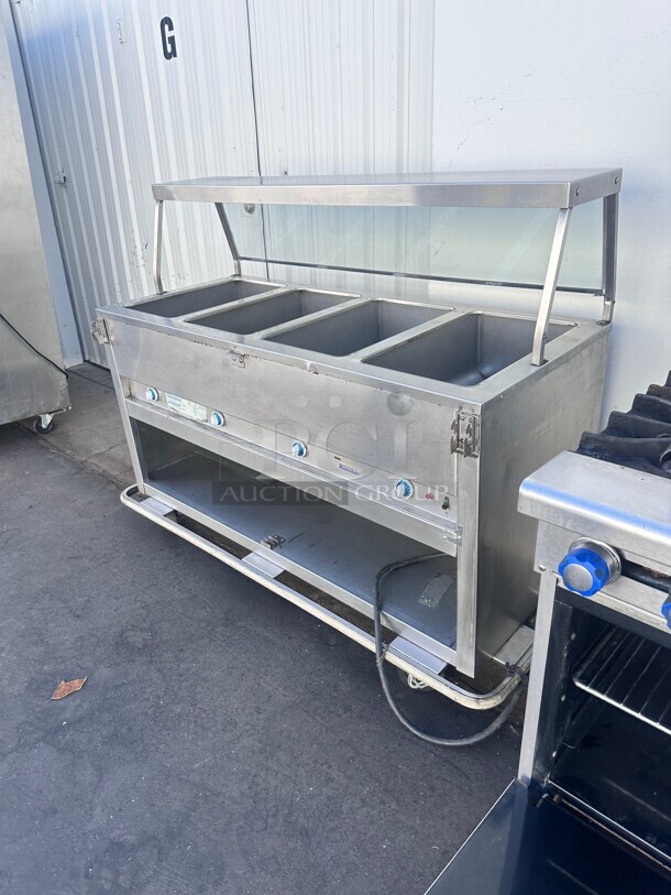 Excellent Condition Duke E304SW Electric 4 Compartment Hot Food Table With Sneeze Guard 220 Volt Tested and Working - Image 1 of 8