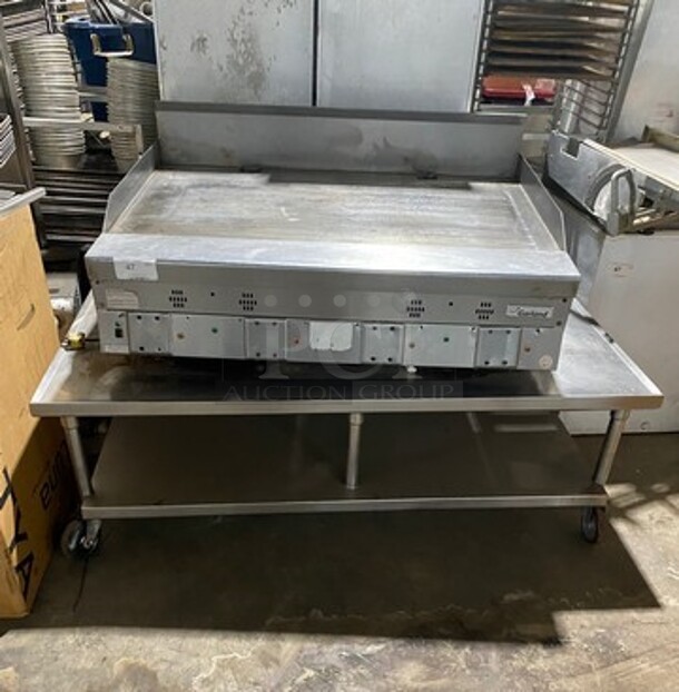 Garland Commercial Countertop Gas Powered Flat Griddle! With Back And Side Splashes! On Equipment Stand! With Storage Space Underneath! All Stainless Steel! On Casters!