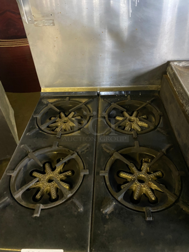 Commercial Natural Gas Powered 4 Burner Stove! With Built In Flat Top Grill! With Back Splash And Salamander Shelf! With Full Size Oven! Metal Oven Rack! With 2 Door Storage Area Underneath! All Stainless Steel! - Image 6 of 12
