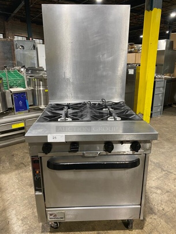 Southbend Commercial Natural Gas Powered 4 Burner Stove! With Raised Back Splash! With Oven Underneath! All Stainless Steel! On Casters!