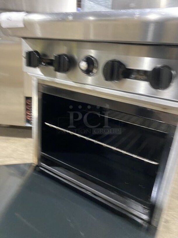 FAB! American Range Natural Gas Powered 4 Burner Range With Full Size Oven Underneath! With 24 Inch Salamander! On Commercial Casters! Working When Removed!  - Image 7 of 9