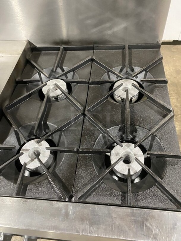 SouthBend Commercial Natural Gas Powered Split Top 4 Burner Stove! With Left Side Flat Griddle! With Full Sized Oven Underneath! With Backsplash! All Stainless Steel! With Metal Oven Racks! On Casters! Model: X336D-1GL SN: 04C65469! - Image 9 of 12