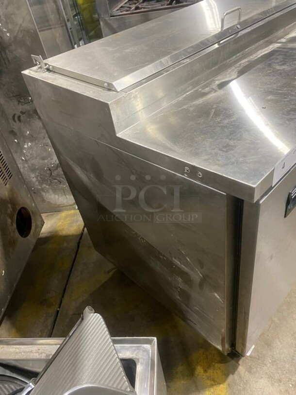 Sweet! LATE MODEL! Central Commercial Refrigerated Pizza Prep Table! With Full Length Removable Cutting Board! With 2 Door Refrigerated Storage Underneath! With Poly Coated Racks! 115V 1 Phase! Model: 69K014 SN: 8060492! On Commercial Casters! Working When Removed!  - Image 3 of 12