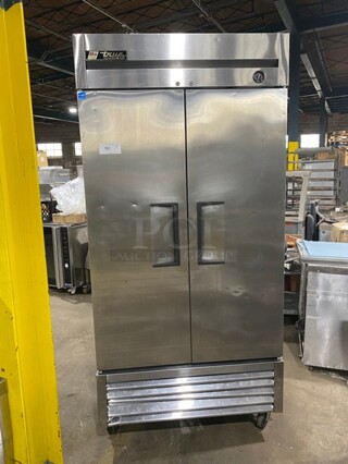 True Commercial 2 Door Reach In Cooler! With Poly Coated Racks! All Stainless Steel! On Casters! Working When Removed! Model: T35 SN:7018068 115V 1PH