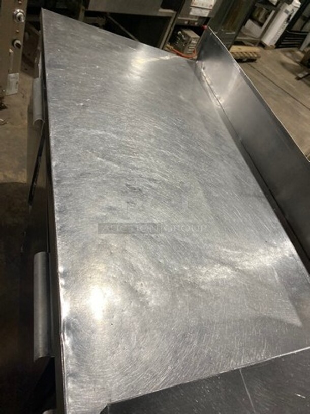 Leader Commercial Refrigerated Sandwich Prep Table! With Back Splash! With 3 Door Storage Space Underneath! Poly Coated Racks! All Stainless Steel! On Casters! Model: LM72S/C SN: PR010562 115V 60HZ 1 Phase - Image 9 of 10