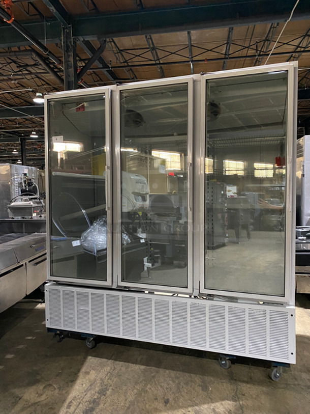 Master Bilt Commercial 3 Door Reach In Freezer Merchandiser! With View Through Doors! With Poly Coated Racks! Model: BLG74HD SN: 014100 115/208/230V 60HZ 1 Phase