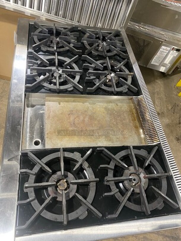 AMAZING! ALL ONE MONEY! Wolf Commercial Gas Powered 6 Burner Stove! With Center Mini Flat Top Griddle! With 1 Full Size & 1 Mini Oven Underneath! With Ventilation Hood System! All Stainless Steel! - Image 5 of 12