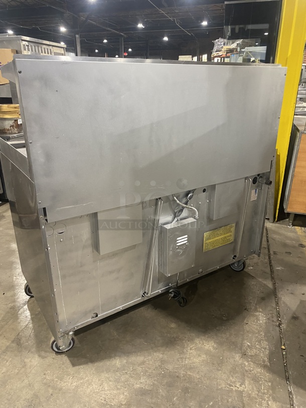 BEAUTIFUL! GARLAND All Stainless Steel Natural Gas Powered 6 Burner Range W/ Raised Right Side Flat Top W/ Cheese Melter! With 2 Ovens W/ Metal Racks! With Raised Over Back Splash & Slamander Shelf! On Commercial Casters! Working When Removed! - Image 4 of 9