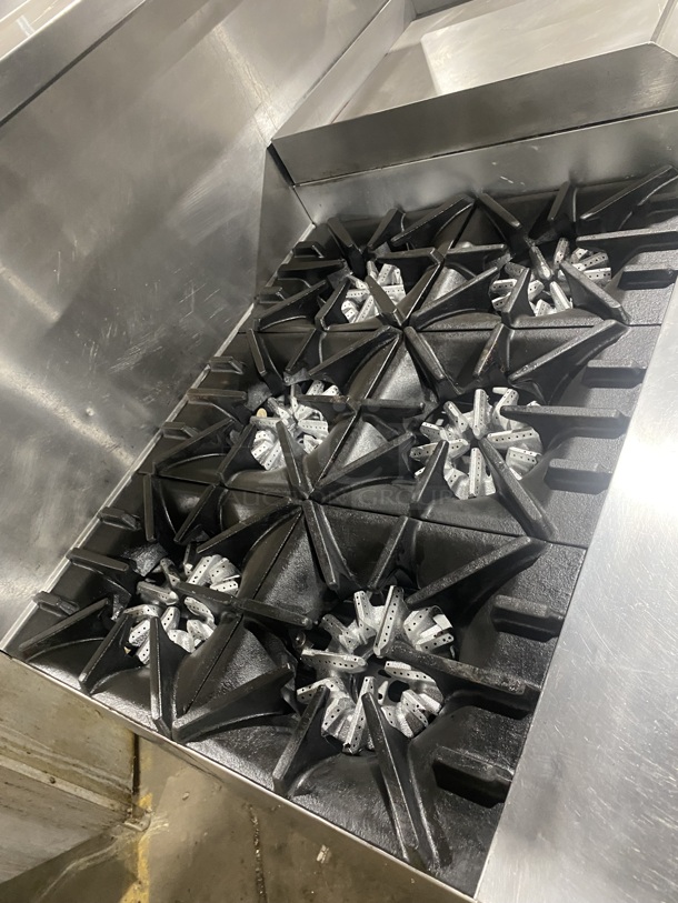 BEAUTIFUL! GARLAND All Stainless Steel Natural Gas Powered 6 Burner Range W/ Raised Right Side Flat Top W/ Cheese Melter! With 2 Ovens W/ Metal Racks! With Raised Over Back Splash & Slamander Shelf! On Commercial Casters! Working When Removed! - Image 7 of 9