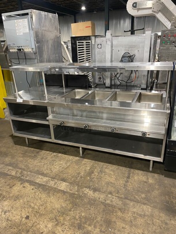 AWESOME! Delfield Commercial Custom Made Electric Powered 4 Well Steam Table! With Over Head Shelf! With Storage Space Underneath! All Stainless Steel! On Legs! WORKING WHEN REMOVED! Model: V1416032 SN: 84833601M 208/30V 60HZ 1 Phase - Image 1 of 9