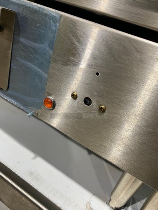 WOW! NEW OUT OF THE BOX! Garland Commercial Countertop Electric Powered Flat Top Griddle! With Back And Side Splashes! On Legs! On Equipment Stand! All Stainless Steel! On Casters! Model: E2448G SN: 0404ME0033 208V 60HZ 3 Phase - Image 8 of 10