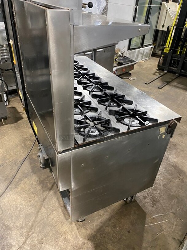 WOW! Hussmann Southbend Stainless Steel Commercial 12 Burner Stove! With One Full Size Convection Oven And Full Size Oven! With Raised Back Splash And Salamander Overhead! On Commercial Casters! Working When Removed! - Image 4 of 12