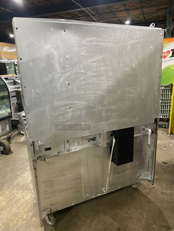 Garland Commercial Gas Powered 8 Burner Stove! With Raised Back Splash And Salamander! With Oven Underneath! All Stainless Steel! On Casters! - Image 4 of 11