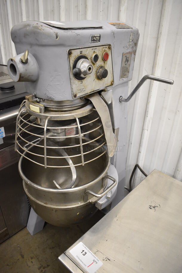 Hobart Model D300 Metal Commercial Floor Style 30 Quart Planetary Dough Mixer w/ Stainless Steel Bowl, Bowl Guard and Dough Hook Attachment. 115 Volts, 1 Phase. 21x24x45. Tested and Powers On But Parts Do Not Move