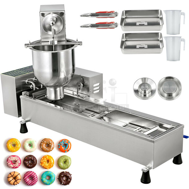 BRAND NEW IN BOX! Model T-101 Stainless Steel Commercial Countertop Electric Powered Automatic Donut Making Machine. 110 Volts. Stock Picture Used As Gallery. 39x19x24.