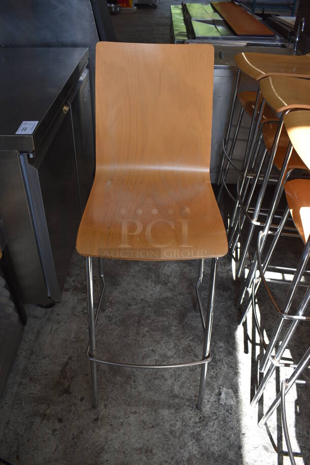4 Wood Pattern Bar Height Chairs on Chrome Finish Metal Legs. Stock Picture - Cosmetic Condition May Vary. 16x19x45. 4 Times Your Bid!