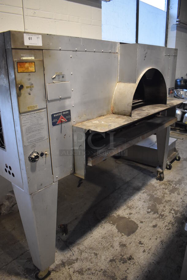 Bakers Pride FC-616 Stainless Steel Commercial Natural Gas Powered Il Forno Pizza Oven w/ Cooking Stones on Metal Legs w/ Commercial Casters. 140,000 BTU. 78x53x63