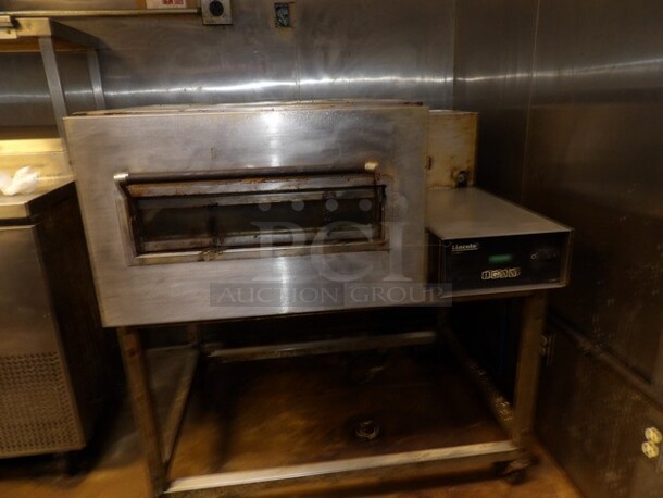 Lincoln Enodis Stainless Express Conveyor Pizza Oven on Wheels, Natural Gas, Single Deck, Single Conveyor, Front Load TESTED AND WORKING  - Image 2 of 5