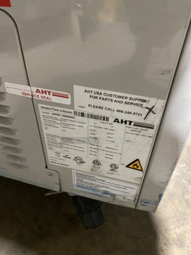 2016 AHT Chest Freezer Merchandiser! Model Manhattan210VS Serial 34990700000059! 110-120V 1Phase! With Baskets! One Glass Dor Missing! On Legs!  - Image 9 of 10