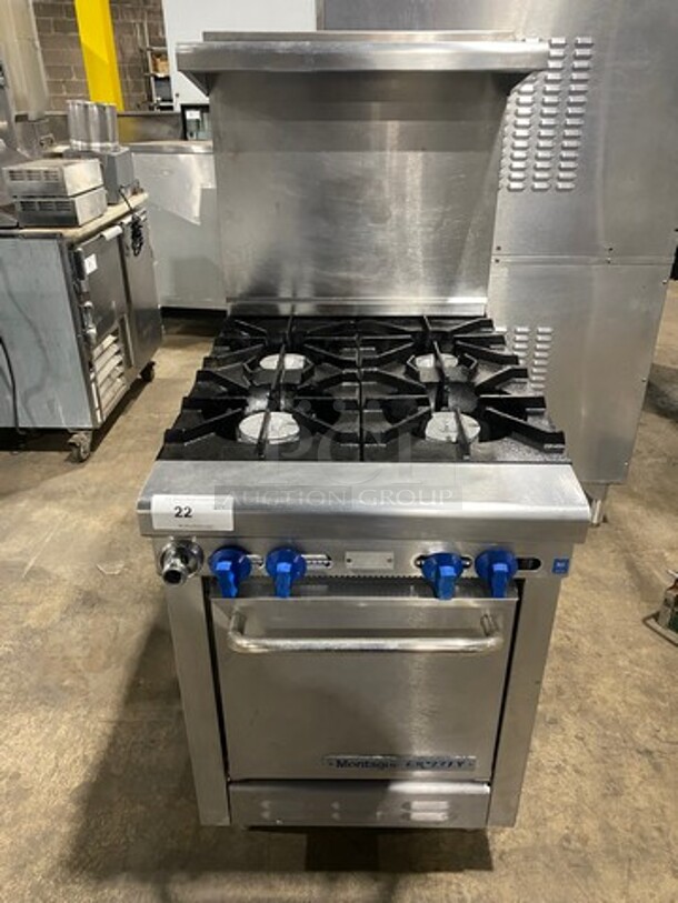 Montague Commercial Natural Gas Powered 4 Burner Stove! With Raised Back Splash And Salamander Shelf! With Oven Underneath! All Stainless Steel! On Legs!