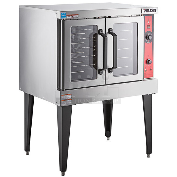 BRAND NEW SCRATCH AND DENT! Vulcan VC4ED ENERGY STAR Stainless Steel Commercial Electric Powered Full Size Convection Oven w/ View Through Doors, Metal Oven Racks and Thermostatic Controls. 480 Volts, 3/1 Phase. No Legs. - Item #1113551