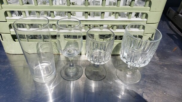 Lot of 25 Miscellaneous Glasses and a 25-Compartment Glass Rack! - Image 1 of 2