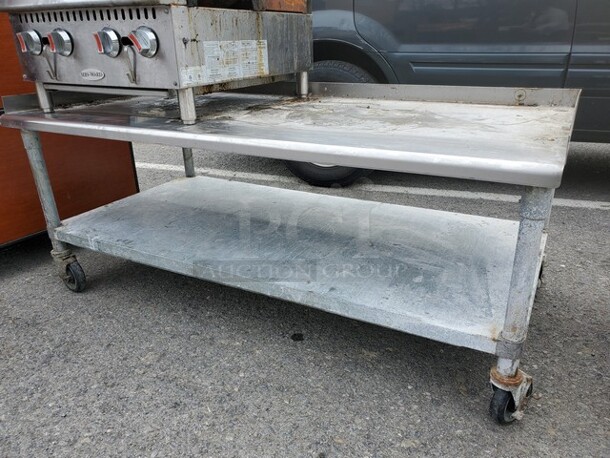 Stainless Steel Stand with Undershelf, and Casters! 60X30X24 - Image 1 of 3