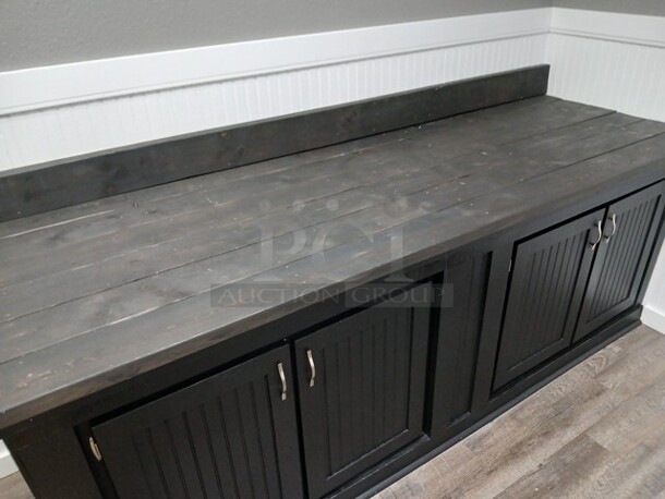 Black Built in Place Cabinet W/4 Doors. 
96"x33"x36"

**LABOR FOR REMOVAL ADDITIONAL FEE, CONTACT MISSOURI DIVISION FOR LABOR QUOTE OR ADDITIONAL QUESTIONS. - Image 2 of 5