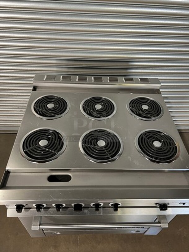 WOW! NEW OUT OF THE BOX! NEVER USED! Garland Heavy Duty Commercial Electric Powered 6 Burner Range With Full Size Convection Oven Underneath! All Stainless Steel Body! With Oven Racks! Model 36ER33 - Image 4 of 9