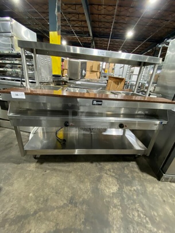 NICE! Randell Commercial Electric Powered 4 Well Steam Table! With Overhead Shelf! With Storage Space Underneath! All Stainless Steel! On Legs! Model: 3314 SN: N32611123092 208V 60HZ 1 Phase - Image 1 of 11