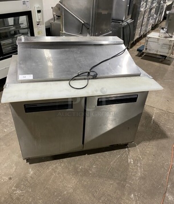 Maxx Cold Commercial Refrigerated Sandwich Prep Table! With Commercial Cutting Board! With 2 Door Storage Space Underneath! Poly Coated Racks! All Stainless Steel! On Casters! Model: MXCR48M SN: 440100 115V 60HZ 1 Phase