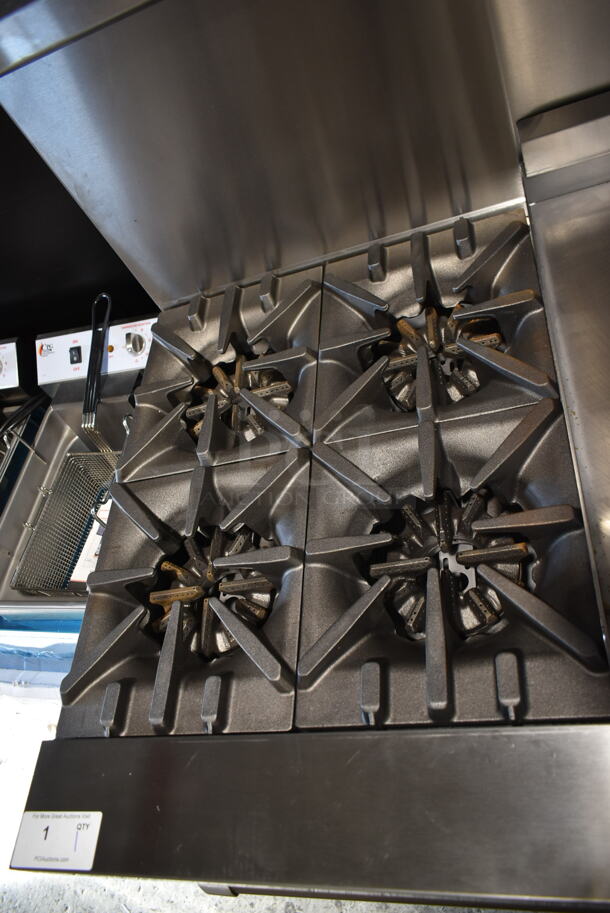 BRAND NEW SCRATCH AND DENT! 2023 Garland G60-4G36RR Stainless Steel Commercial Natural Gas Powered 4 Burner Range w/ Flat Top Griddle, 2 Ovens, Back Splash and Over Shelf. Stock Picture Used as Gallery. - Image 3 of 10