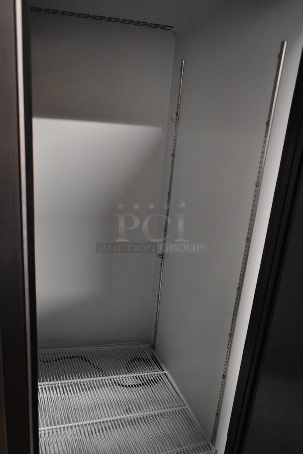 BRAND NEW SCRATCH AND DENT! Beverage Air SF2HC-1S Stainless Steel Commercial 2 Door Reach In Freezer w/ Poly Coated Racks and Commercial Casters. 115 Volts, 1 Phase. Cannot Test Due To Missing Power Cord  - Image 4 of 7