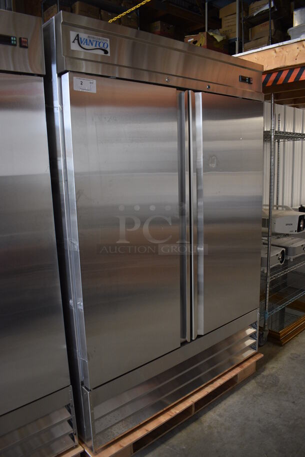 BRAND NEW SCRATCH AND DENT! Avantco Model 178SS2FHC Stainless Steel Commercial Two Door Reach In Freezer w/ Poly Coated Racks on Commercial Casters. 115 Volts, 1 Phase. 54x32x77.5. Tested and Working! - Image 3 of 7