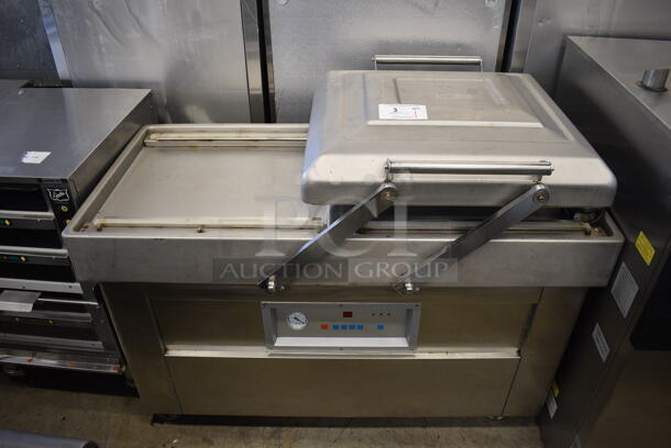 Metal Commercial Floor Style Electric Powered Double Chamber Vacuum Sealer on Commercial Casters. 250 Volts, 3 Phase. 50x29x40. Tested and Working!