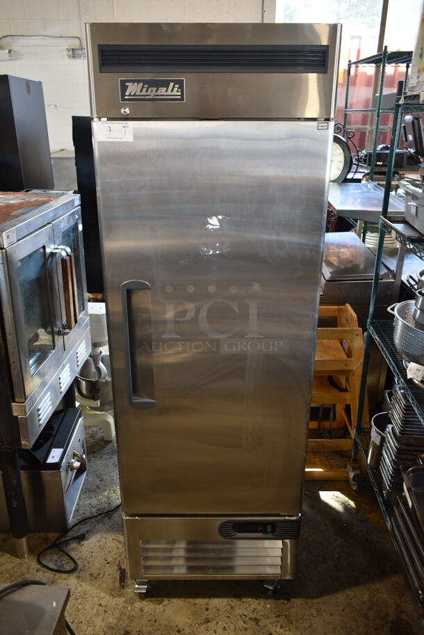BRAND NEW SCRATCH AND DENT! 2021 Migali C-1FB-HC Stainless Steel Commercial Single Door Reach In Freezer w/ Poly Coated Racks on Commercial Casters. 115 Volts, 1 Phase. Tested and Working! - Image 1 of 10