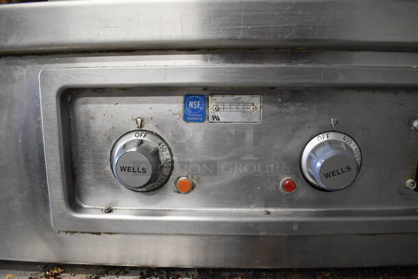 Wells Stainless Steel Commercial Work Station w/ Flat Top Griddle, Charbroiler, Well and Side Under Shelves. Does Not Come w/ Delfield 4 Drawer Chef Base: Goes GREAT w/ Item 246! 115 Volts, 1 Phase Refrigeration. 208-240 Volt, 3 Phase Heating. 114x36x34 - Image 4 of 10