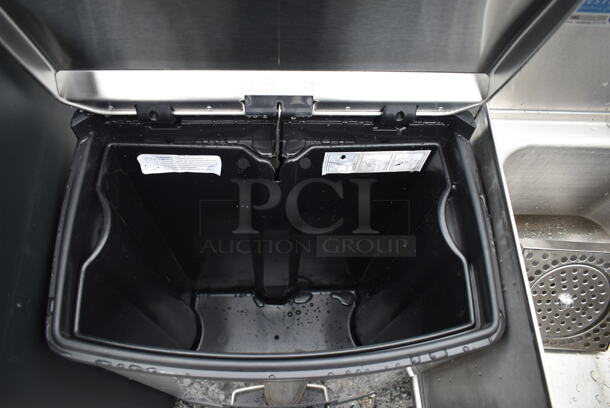 BRAND NEW SCRATCH AND DENT! Rubbermaid 6901901992BK Slim Jim Stainless Steel Black Accent Front Step-On Rectangular Trash Can with Single Rigid Plastic Liner - 52 Qt. / 13 Gallon - Image 4 of 5