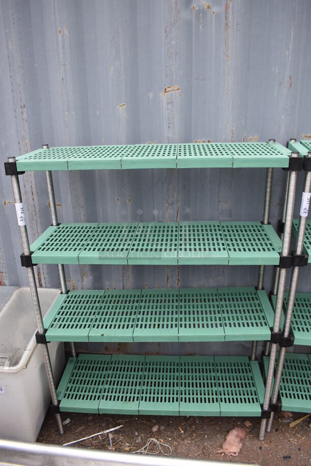 Metal and Poly 4 Tier Shelving Unit. BUYER MUST DISMANTLE. PCI CANNOT DISMANTLE FOR SHIPPING. PLEASE CONSIDER FREIGHT CHARGES.