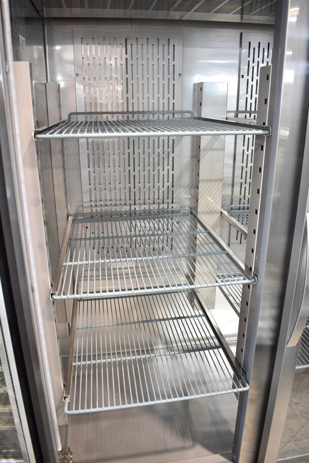 BRAND NEW SCRATCH AND DENT! 2023 Avantco 178Z2RGHC Stainless Steel Commercial 2 Door Reach In Cooler Merchandiser w/ Poly Coated Racks on Commercial Casters. See Pictures for Crack in Right Door. 115 Volts, 1 Phase. Tested and Powers On But Does Not Get Cold - Image 5 of 7