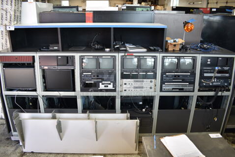 Television Production Station w/ Acer x193w Monitor, Planar PL1700 Monitor, 6 JVC TM-1011 Monitors, 2 JVC SR-DVM600 DVD/HDD/DVD Recorder, Pansonic AG-DV2500 Digital Video Recorder, JVC SR-MV45 VHS/DVD Recorder, Extron VSC500 Video Scan Converter, Extron DA2 RGBHV Wideband RGB Distribution Amplifier, 2 Panasonic AW-RC600 Remote Control Rack Units, Anchor Speaker, Tascam CD-RW900SL Slot Loading CD Recorder Rack Unit, Crown D-45 Power Amplifier Rack Unit, Clear Com MS-702 2 Channel Main Station Rack Unit, Drake VM2050 T Channel Video Modulator.